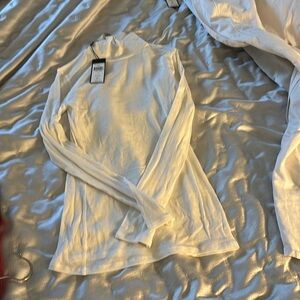BCBG MaxAzaria white high neck top. Brand New tags still attached!